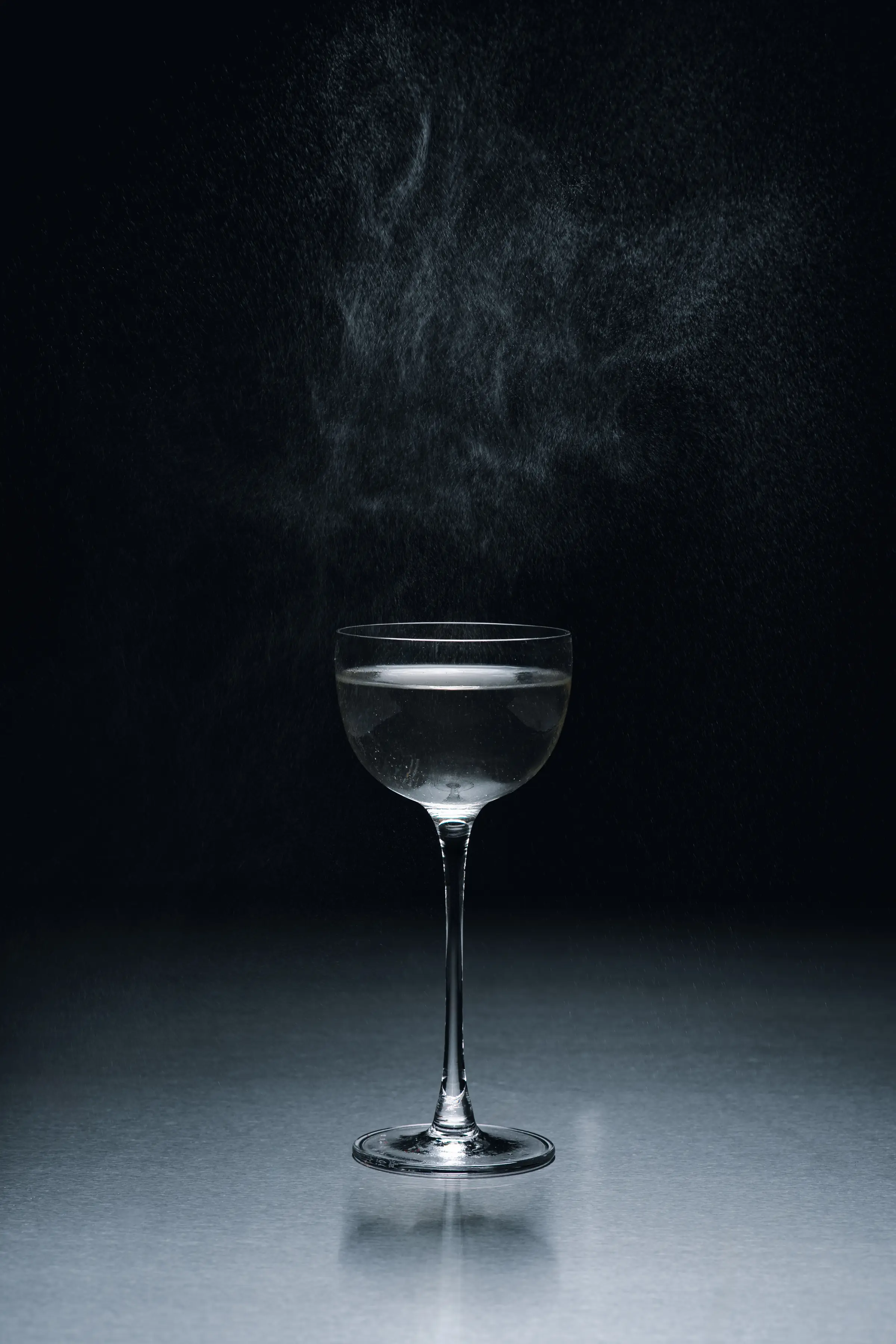 A cocktail served in a coupe at the bar of Holographik Space