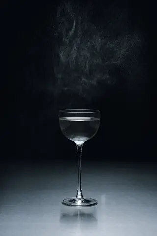 A cocktail served in a coupe at the bar of Holographik Space