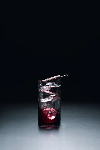 A long drink over cracked ice at the bar of Holographik Space