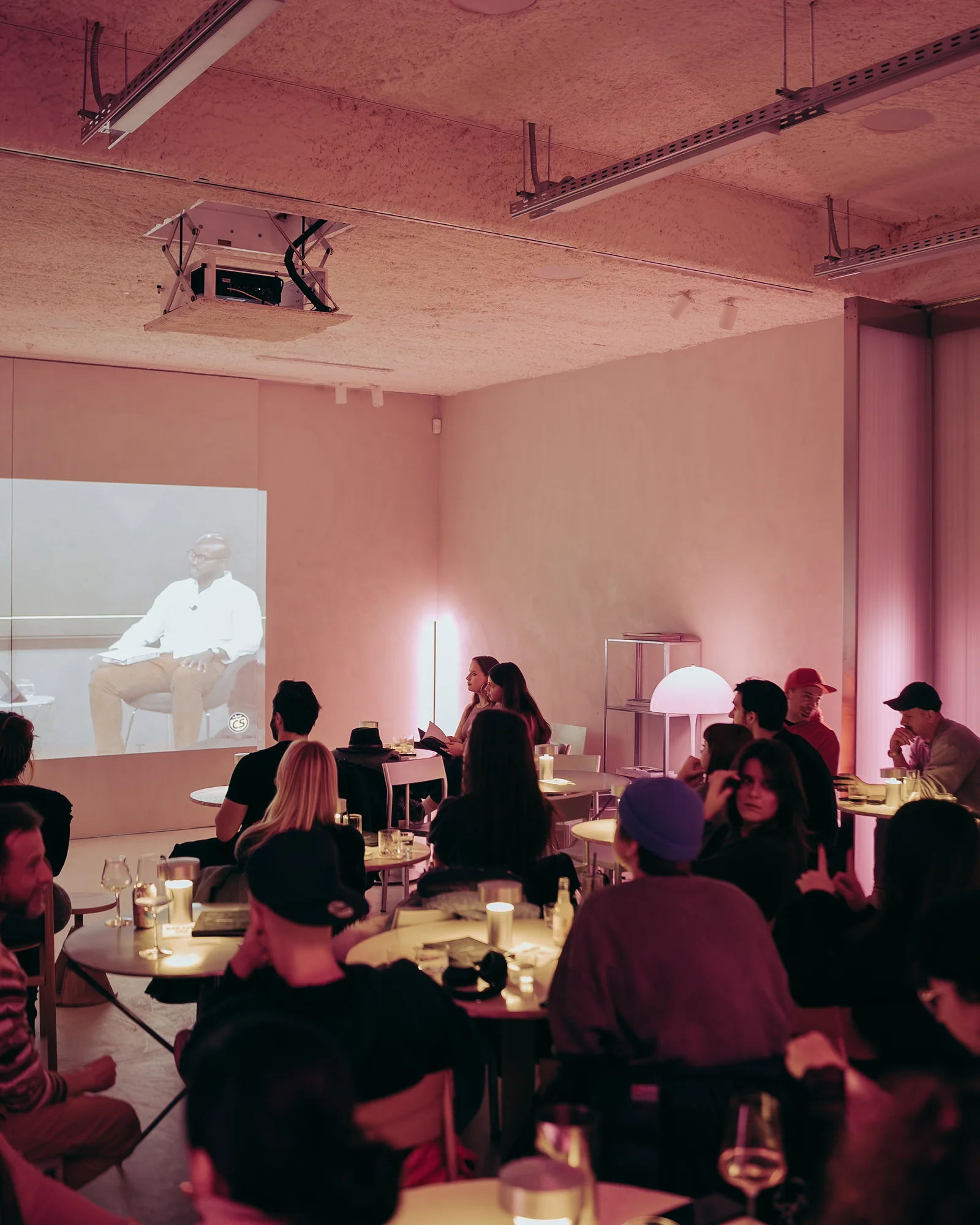 The audience under the projection at the previous edition of The Drop by Taste