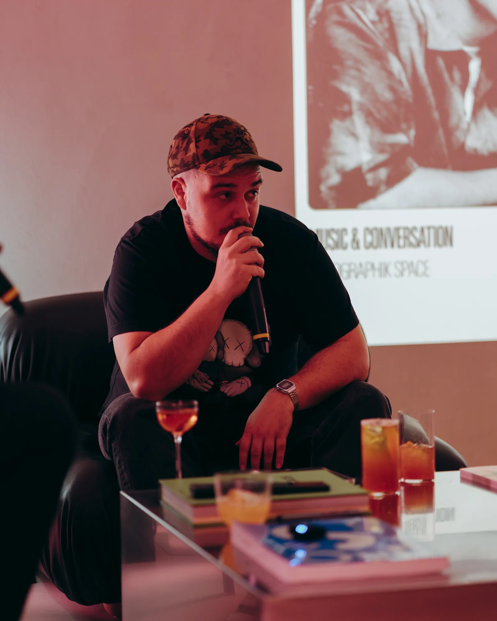 BILL.E with a microphone at the previous edition of The Drop by Taste